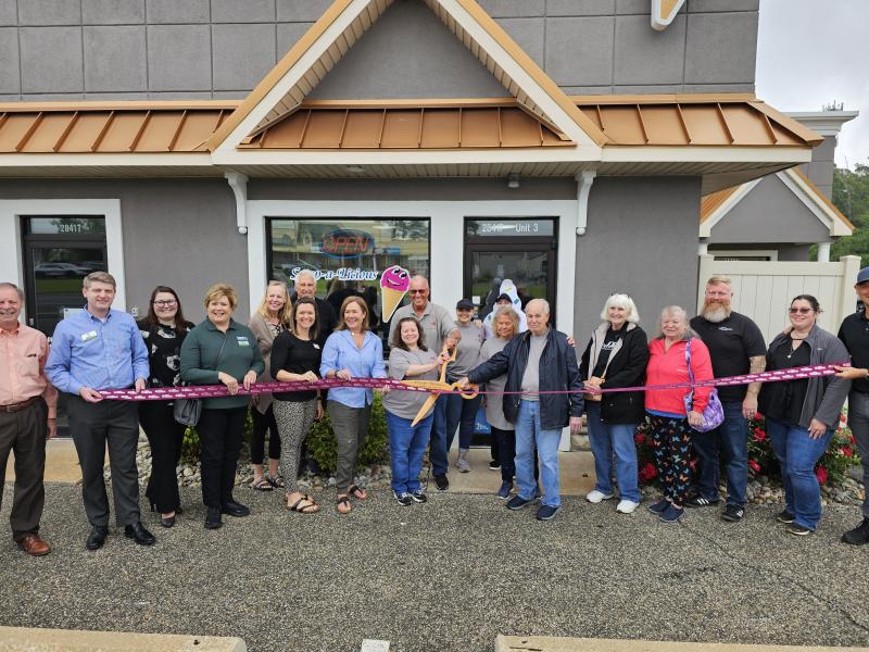 Scoop-a-Licious ribbon-cutting attendees shown are (l-r) Mitch Rogers, Matthew Sellers, Taylor Quillen, Nancy Pinera, Sandra von Kampen, David Baker, Kim Benton, Anne Angel, co-owners Sherrie Hearn and Phil Noel, Arianna Alexander, Alleah Spooner, Peggy Hearn, Bob Hearn, Linda Mann, Dee Jones, Jamie Burk, Robin Scarborough and Jeremy Brown. SUBMITTED PHOTO